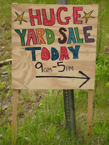 Colorful yard sale sign