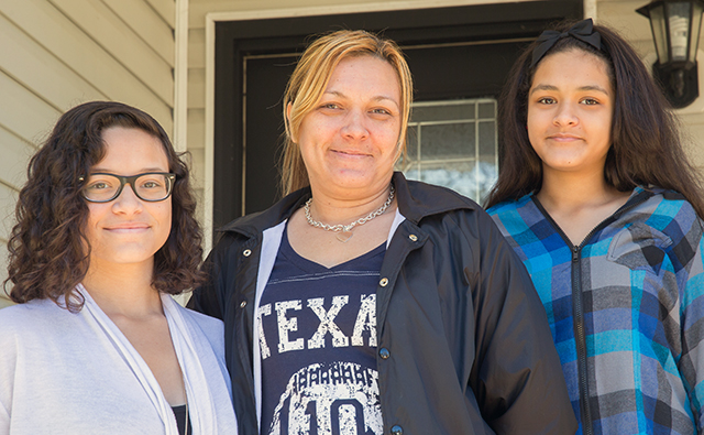 Habitat homeowner Barbara Gotay and daughters, Raleigh, NC