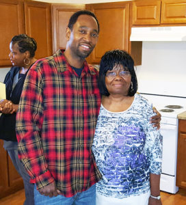 Habitat homeowner with family at home dedication