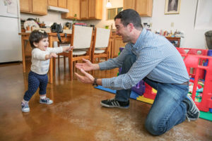 Habitat homeowner watches daughter's first steps