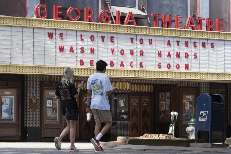 Georgia Theatre marquee: We love you. Wash your hands. Be back soon.