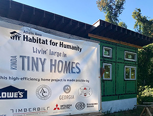 Sponsor banner outside Kinda Tiny Home